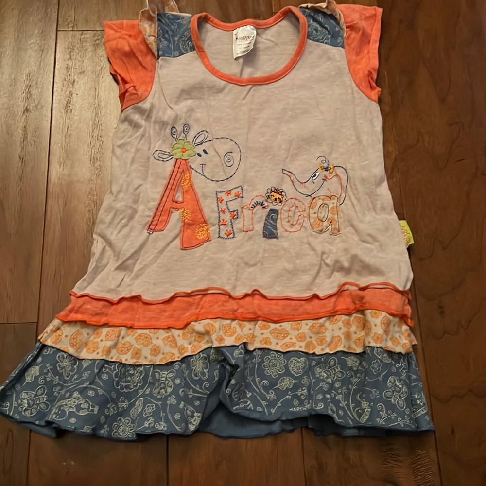 Cute Africa logo girls top in 6-7 years size